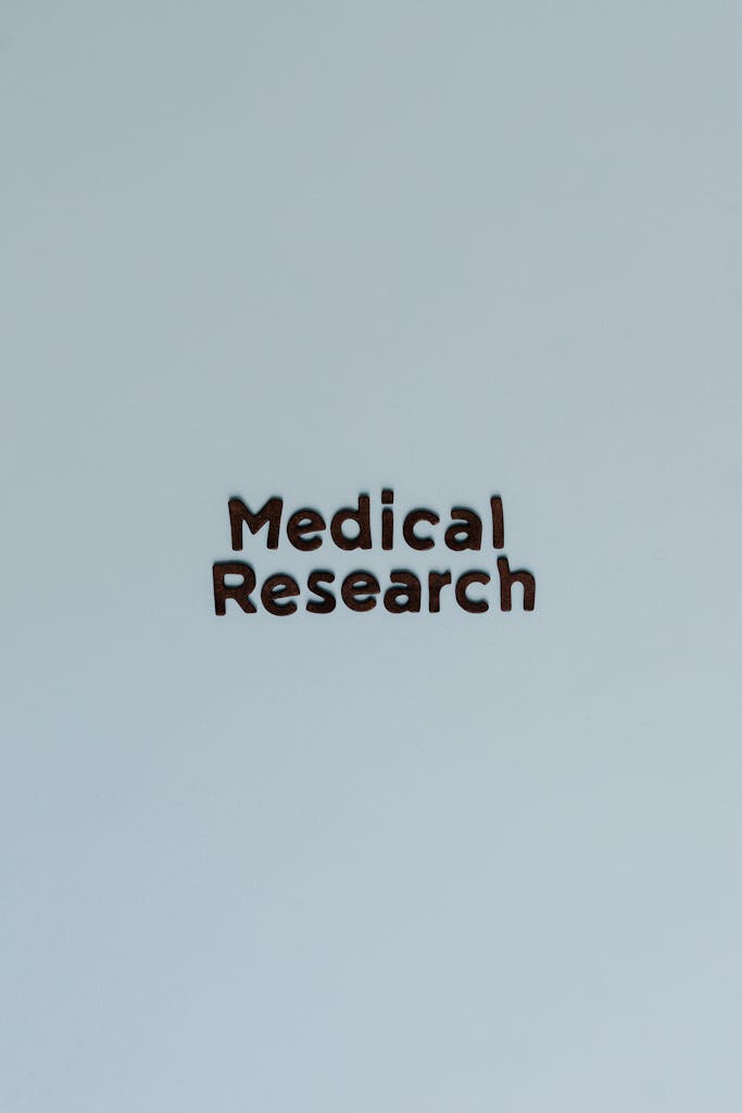 Simple and minimalist image featuring the phrase 'Medical Research' against a light blue background.